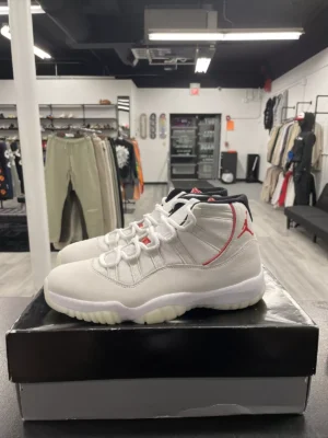 Air Jordan 11 Retro Platinum Tint Sneakers – Reflective Upper