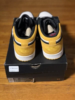 Air Jordan 1 Low “University Gold” – Premium Leather