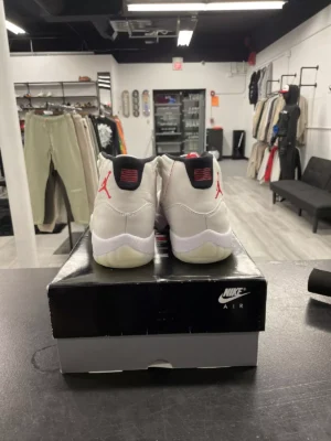 Air Jordan 11 Retro Platinum Tint Sneakers – Reflective Upper