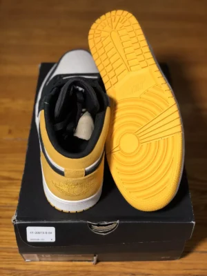 Air Jordan 1 Low “University Gold” – Premium Leather